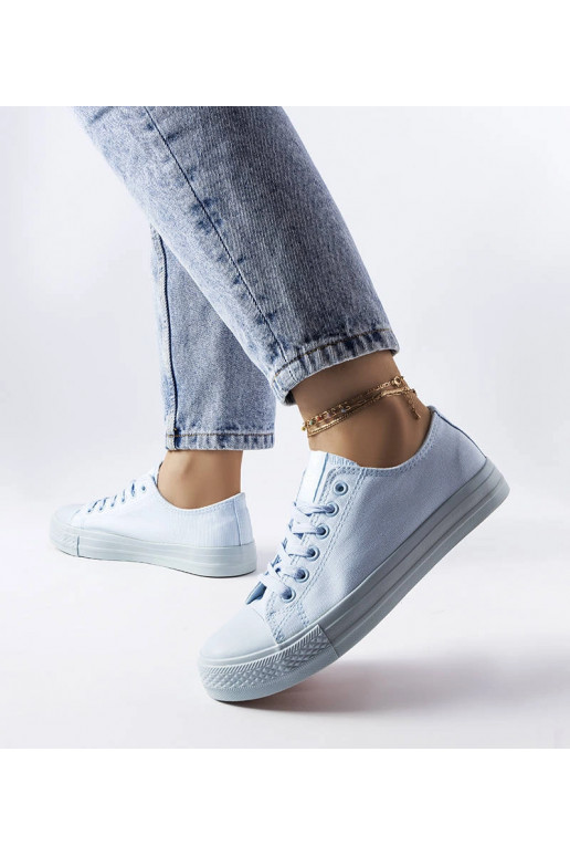 Esmeraude sinisest kangast tossud