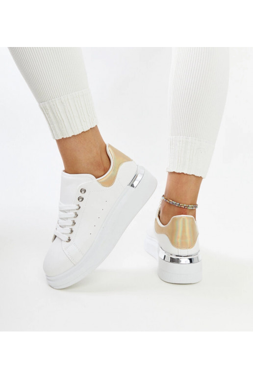 Valged spordijalatsid kuldse...