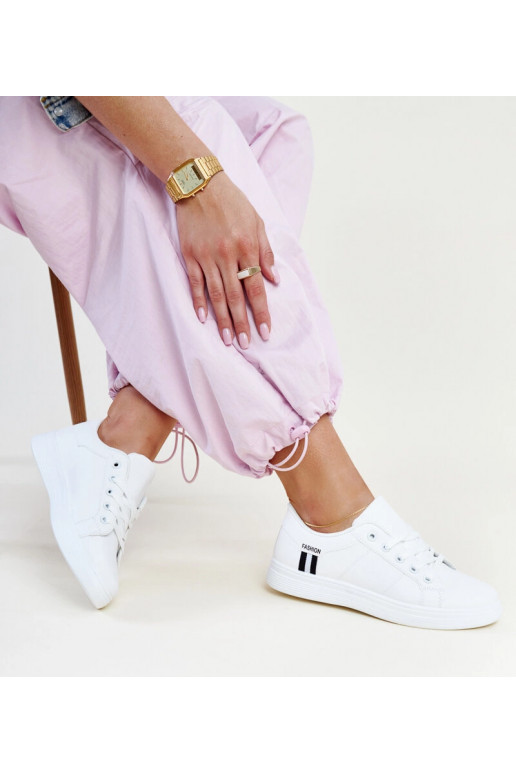 Valged naiste tossud paeltega tossud...