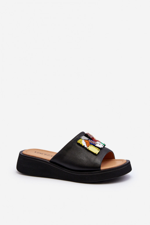 Plätud naturaalsest nahast Pealiste omad kaunistustega msuud Asames Plätud naturaalsest nahast Pealiste omad kaunistustega msuud Asames