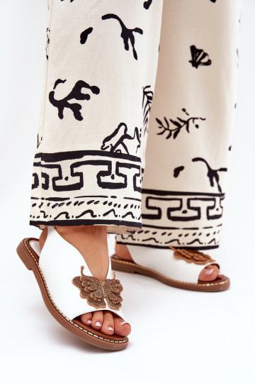 Pealistesandaalid laiade nööridega kaunistustega valget värvi Setorina