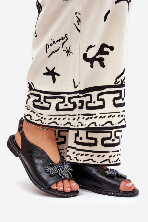 Läikivad Pealistesandaalid kaunistustega sileda tallaga msuud Russona Läikivad Pealistesandaalid kaunistustega sileda tallaga msuud Russona