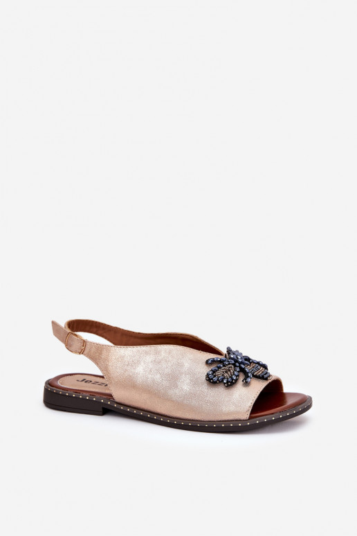 Läikivad Pealistesandaalid kaunistustega sileda tallaga Kuldset värvi Russona Läikivad Pealistesandaalid kaunistustega sileda tallaga Kuldset värvi Russona