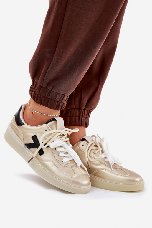 Sellel ondal spordijalatsid Pealiste omad Kuldset värvi Zelevelis Sellel ondal spordijalatsid Pealiste omad Kuldset värvi Zelevelis