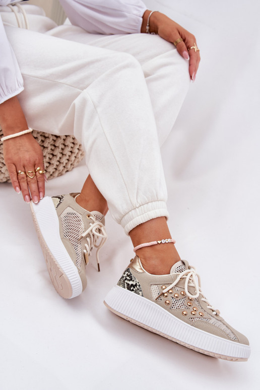 spordijalatsid Pealiste omad võrguga Ja trukid beeži värvi Ogalda spordijalatsid Pealiste omad võrguga Ja trukid beeži värvi Ogalda